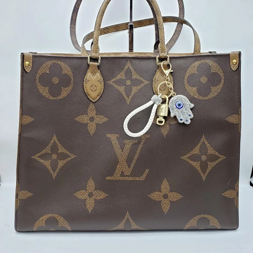 Authentic Louis Vuitton Lock & Key with unbranded Evil Eye Bagcharm